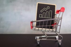 sales chart inside shopping trolley copy space text business growth profit concept